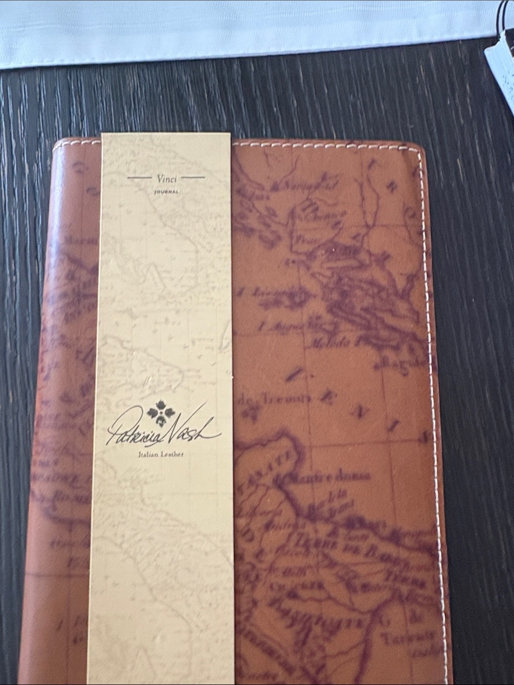 Patricia Nash tan and brown leather-look journal with map motif